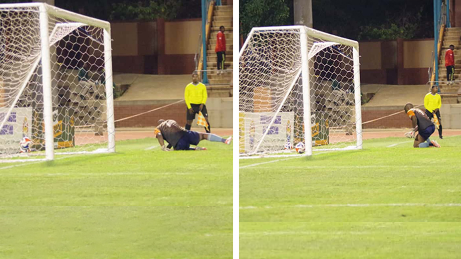 Manzini Sea Birds goalkeeper Lindani 'Kitso' Mtsetfwa watches the ball as it goes to kiss the net from the spot by Moneni Pirates' Vukile Khumalo. (Pic: Nimrod Hlophe)